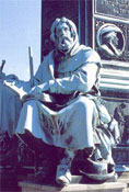 Pietro Valdo ai piedi del Monumento a Lutero a Worms
